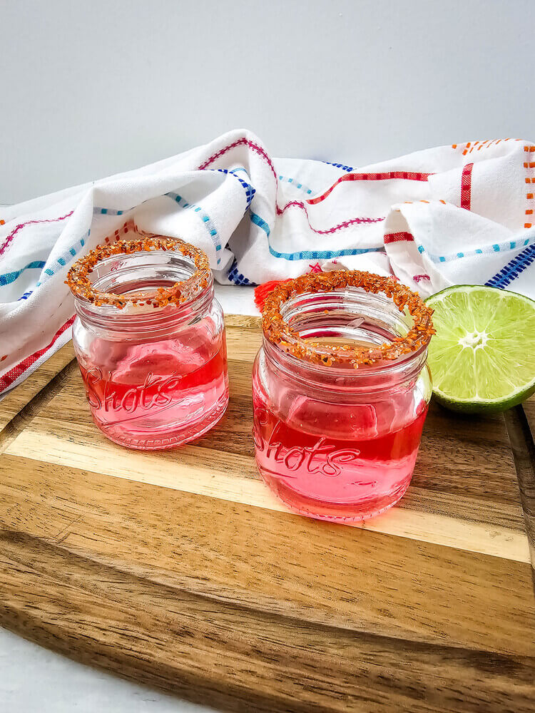 Watermelon Shot glasses on a brown table