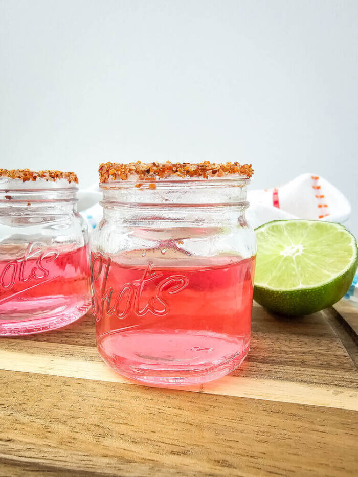 Watermelon Shot glasses on a brown table