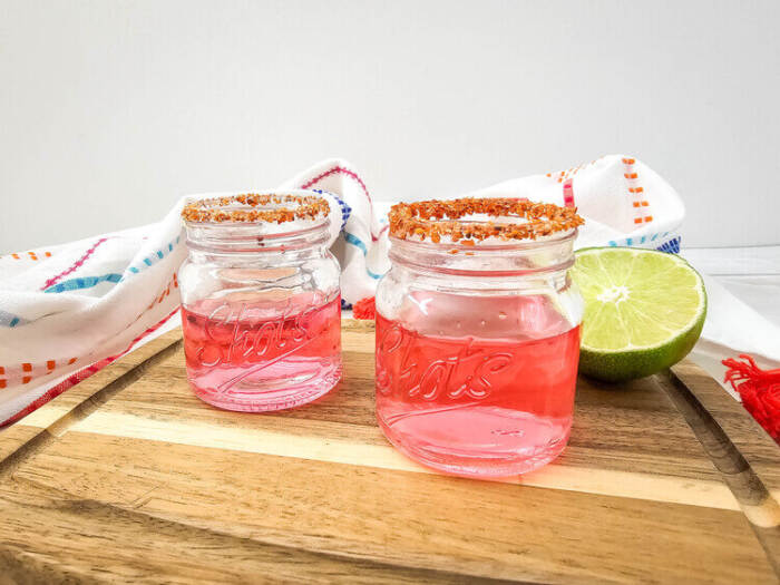 Watermelon Shot glasses on a brown table