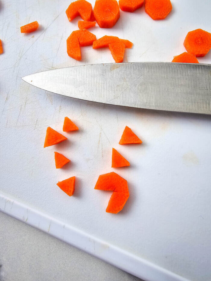 Small carrot pieces cut into triangles for chick beaks on deviled eggs.