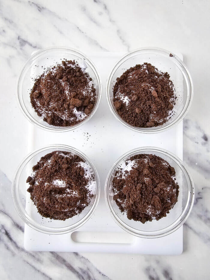 More chocolate cookie crumbs added to pudding layer for dirt cups.