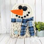 Handmade rope snowman winter wall decor.