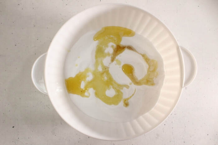 Wet ingredients added to dry mixture for bubble bath bars
