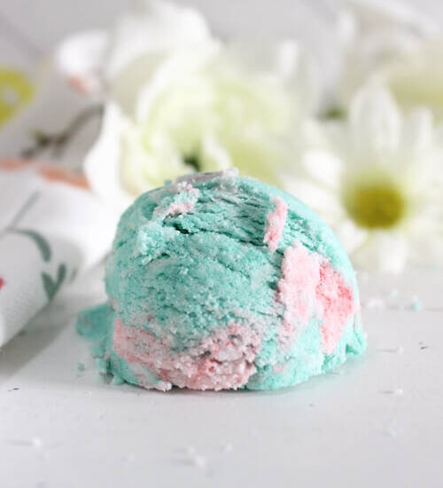 Finished bubble bath bar scoop styled with flowers