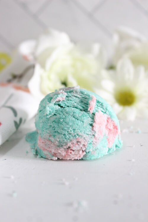 Finished bubble bath bar scoop styled with flowers