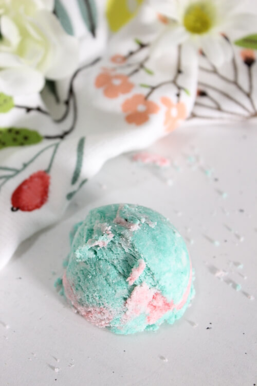 Styled bubble bath bar with spring decor and florals
