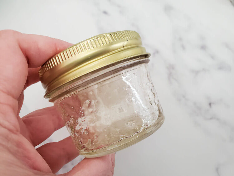 A small jar of eucalyptus bath bombs ingredients.